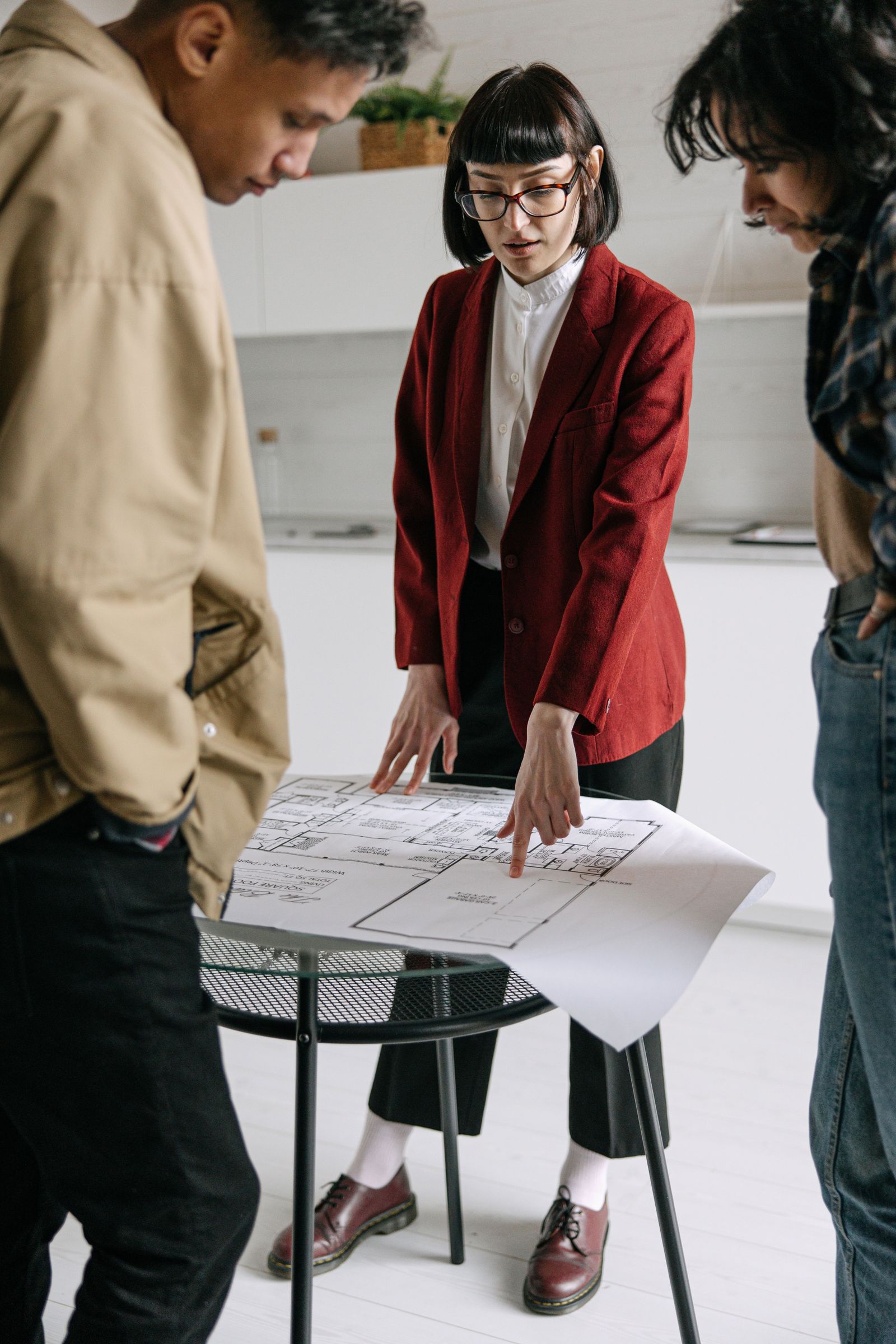 Architect reviewing house plans with client