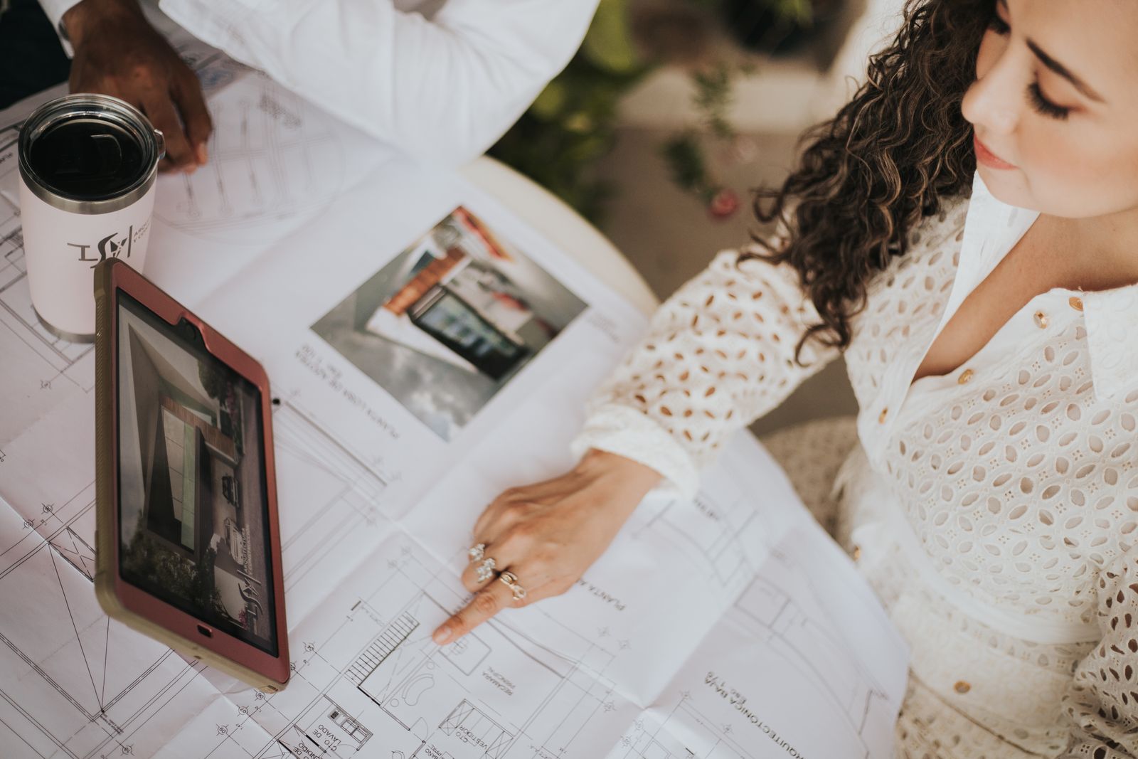 Architect reviewing house plans with client