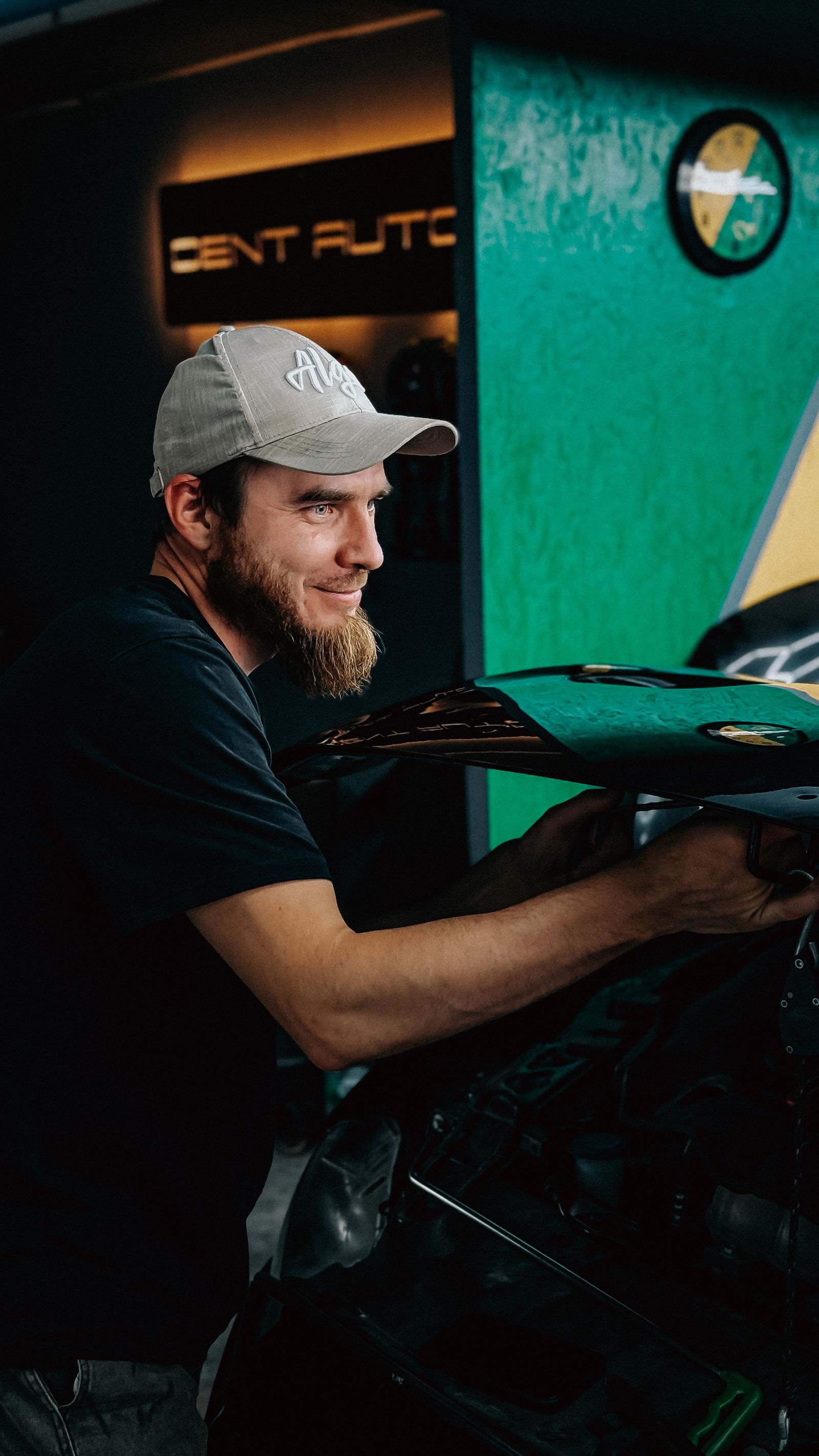 Auto technician working in garage environment