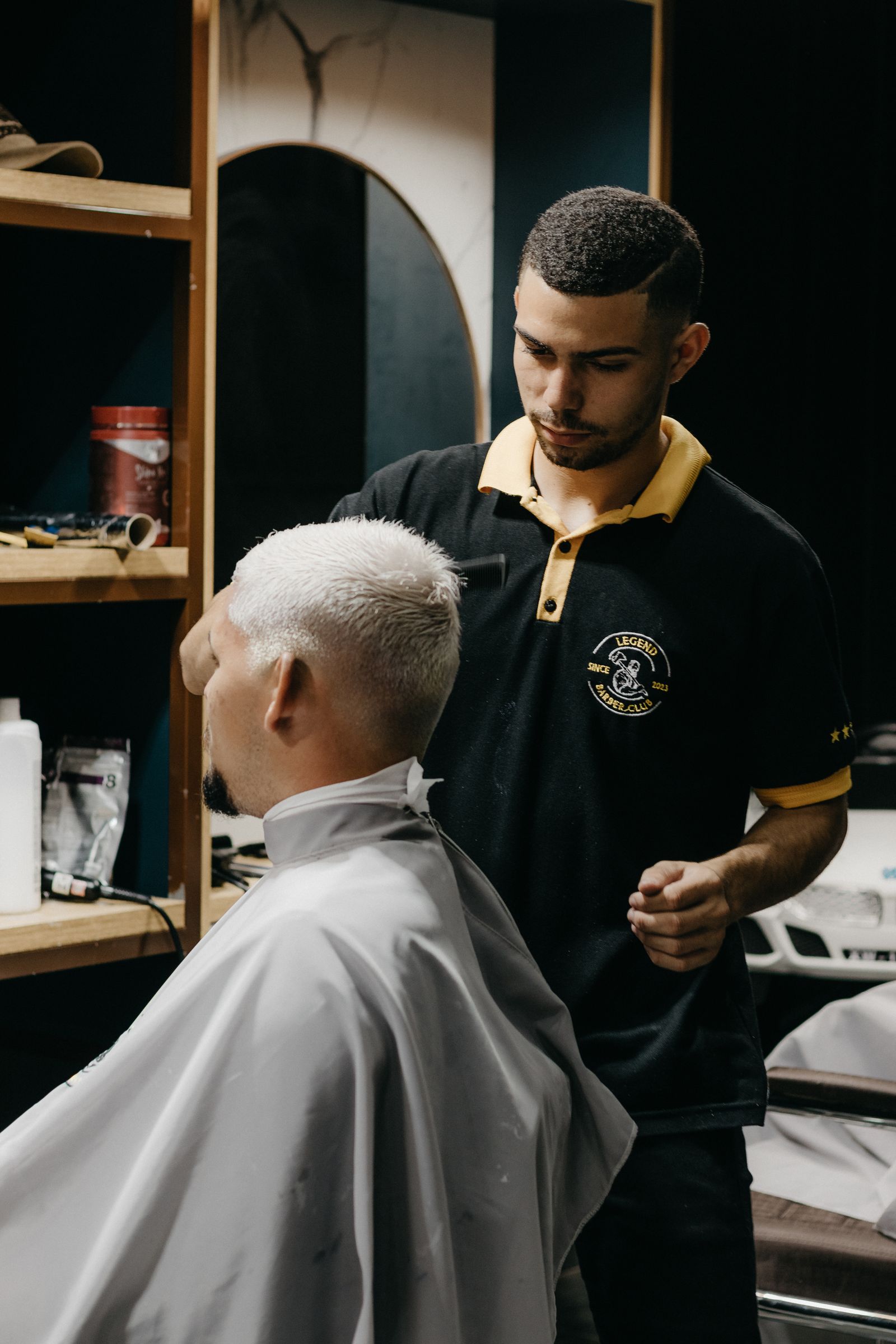 Elderly man at barber shop