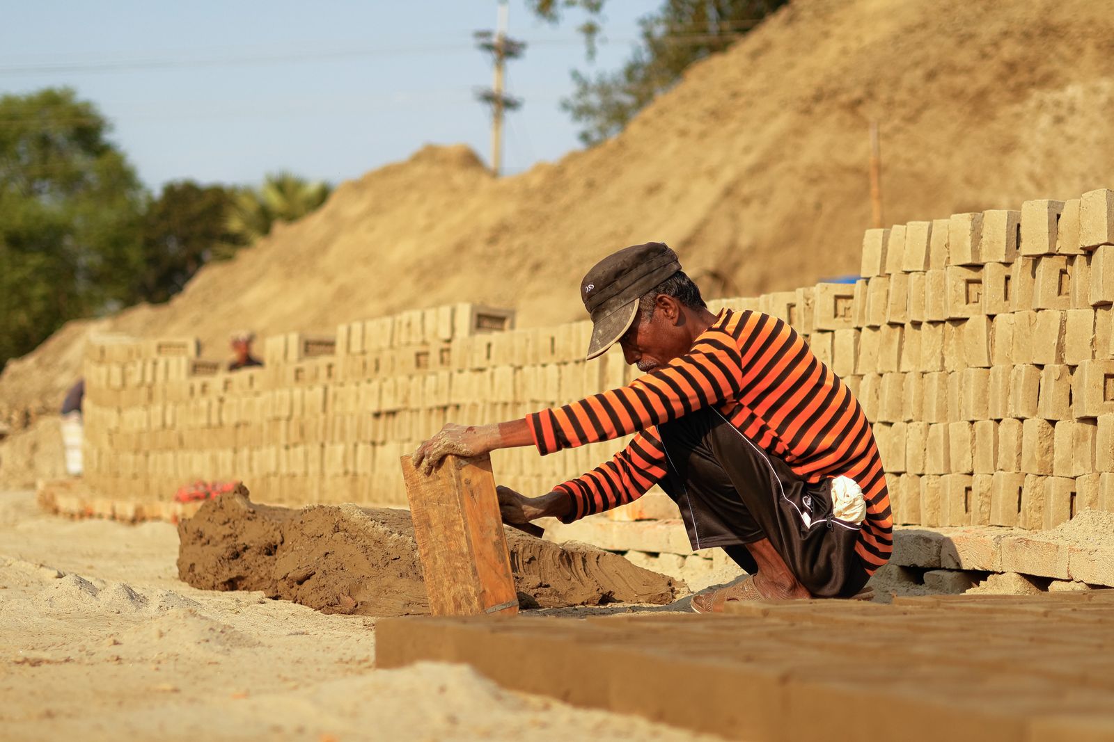 Brick worker at construction site in bangladesh