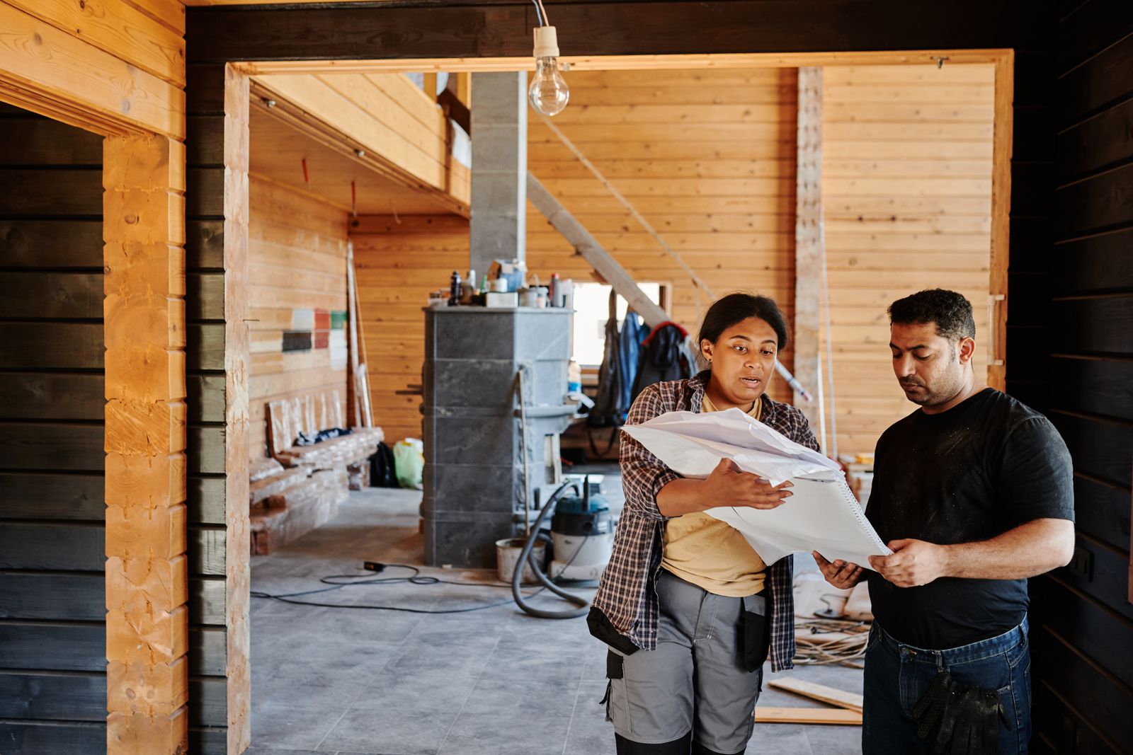 Home inspector with home buyer attic