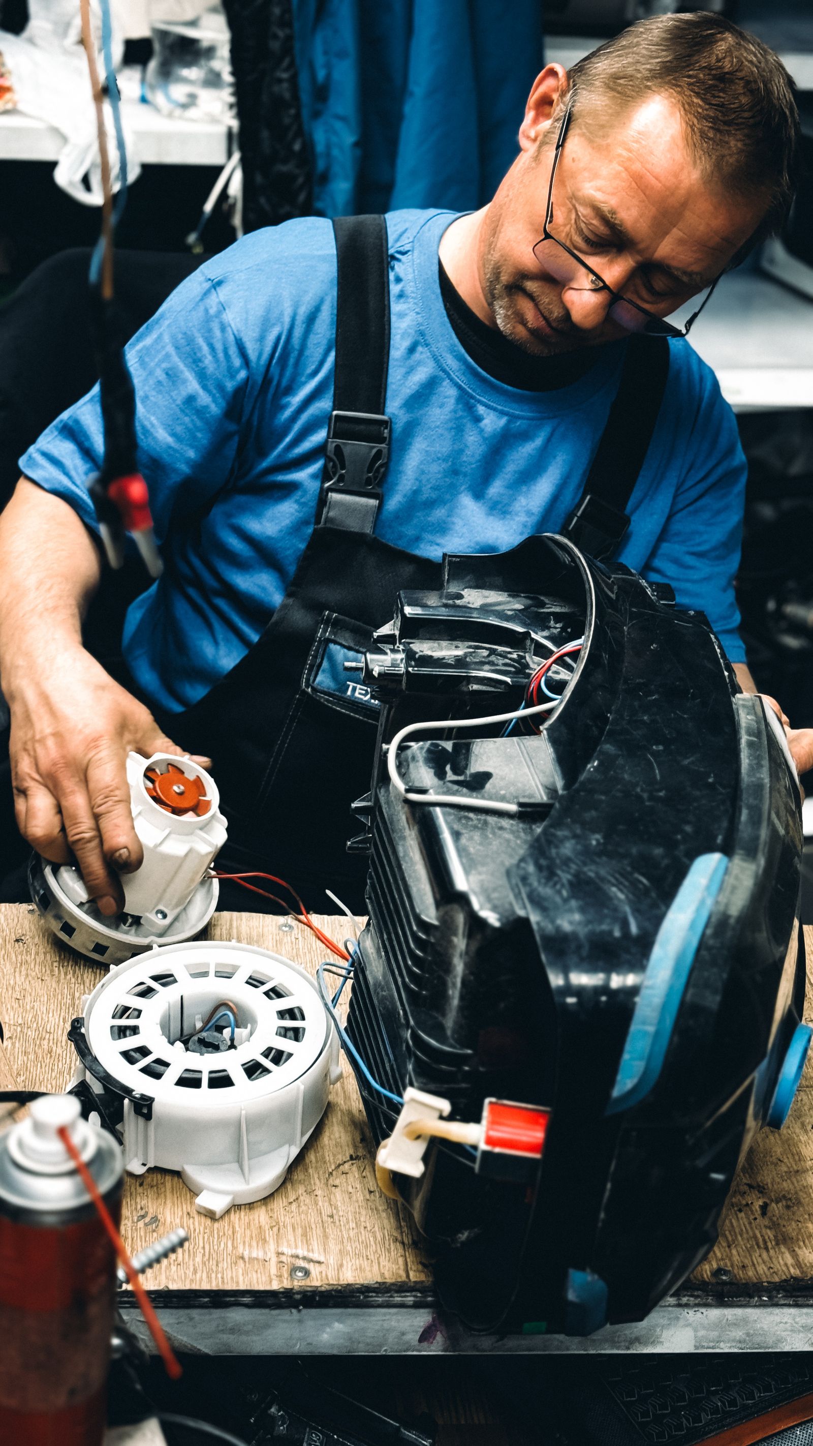 Skilled technician repairing electrical device