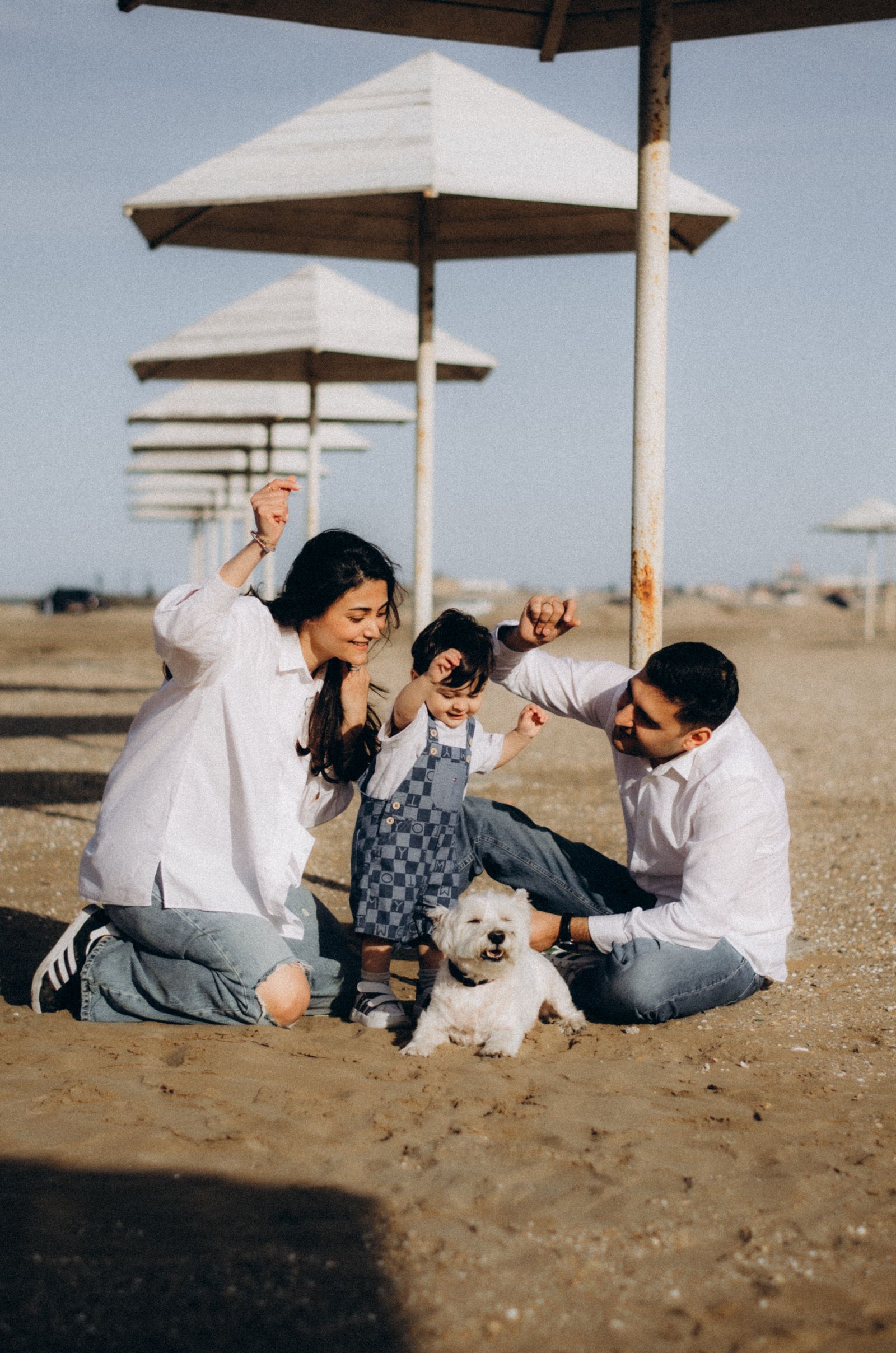 Photographer photographing family outdoors