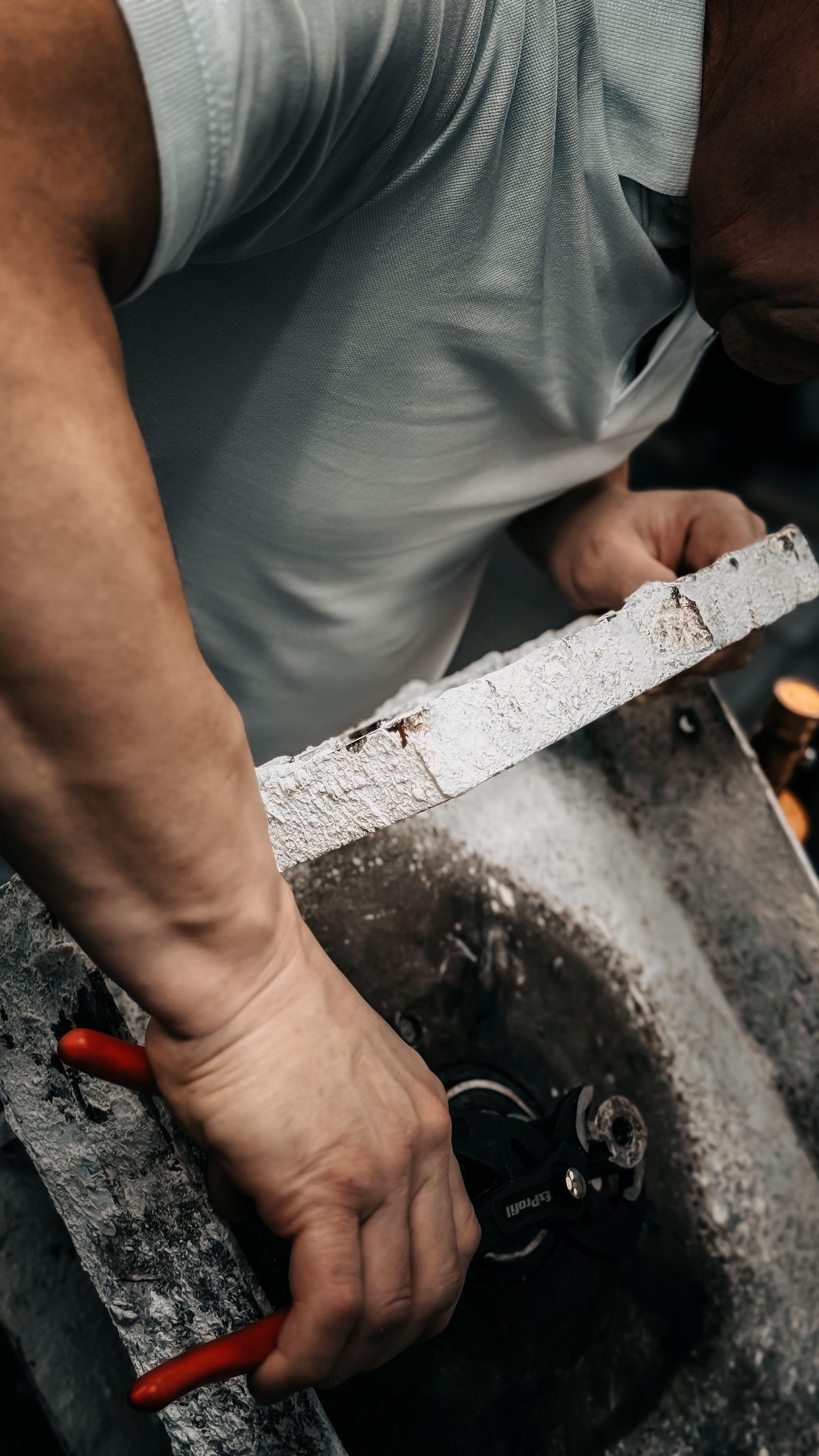 Close up of craftsman working on mechanical repair