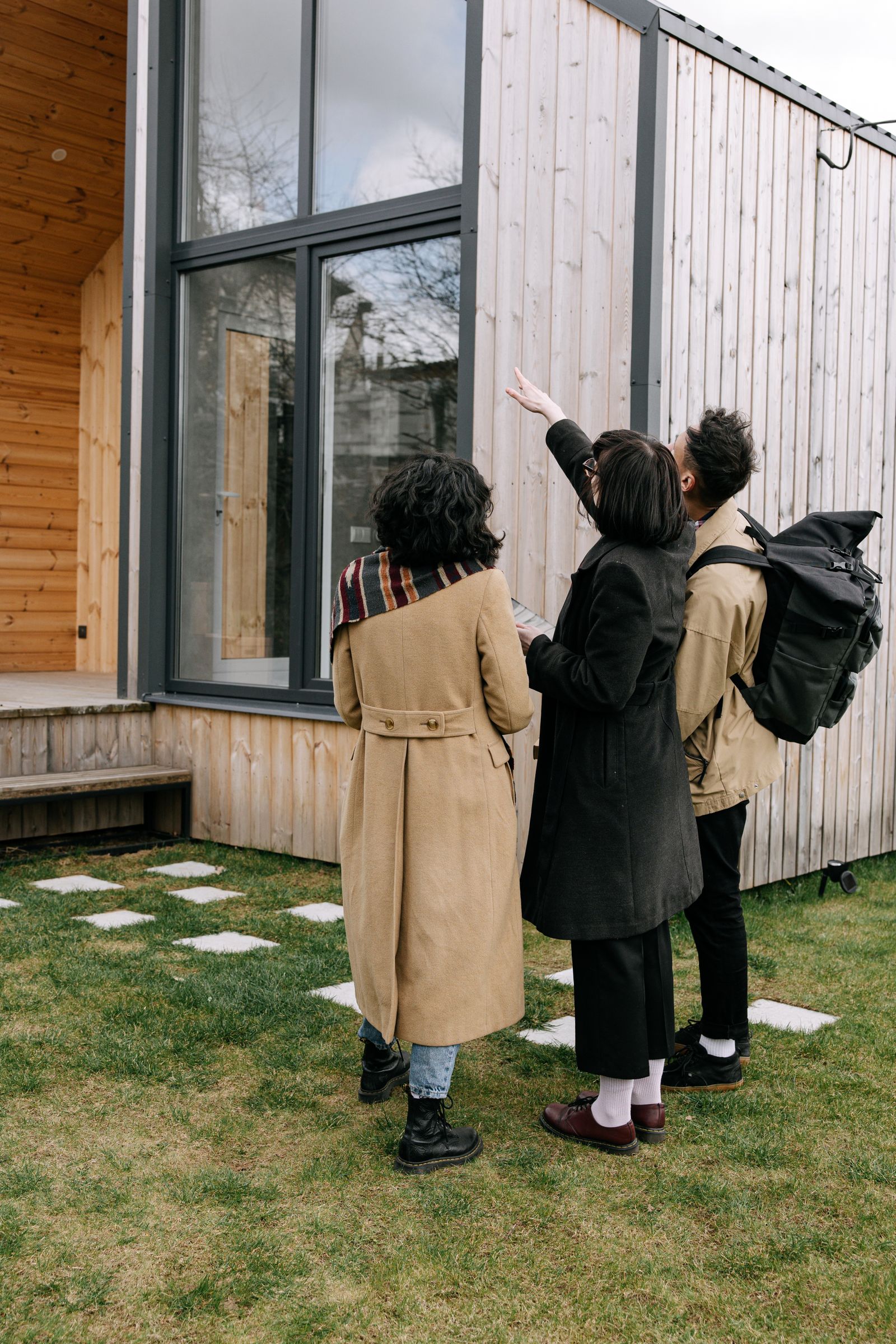 Real estate agent showing house to couple