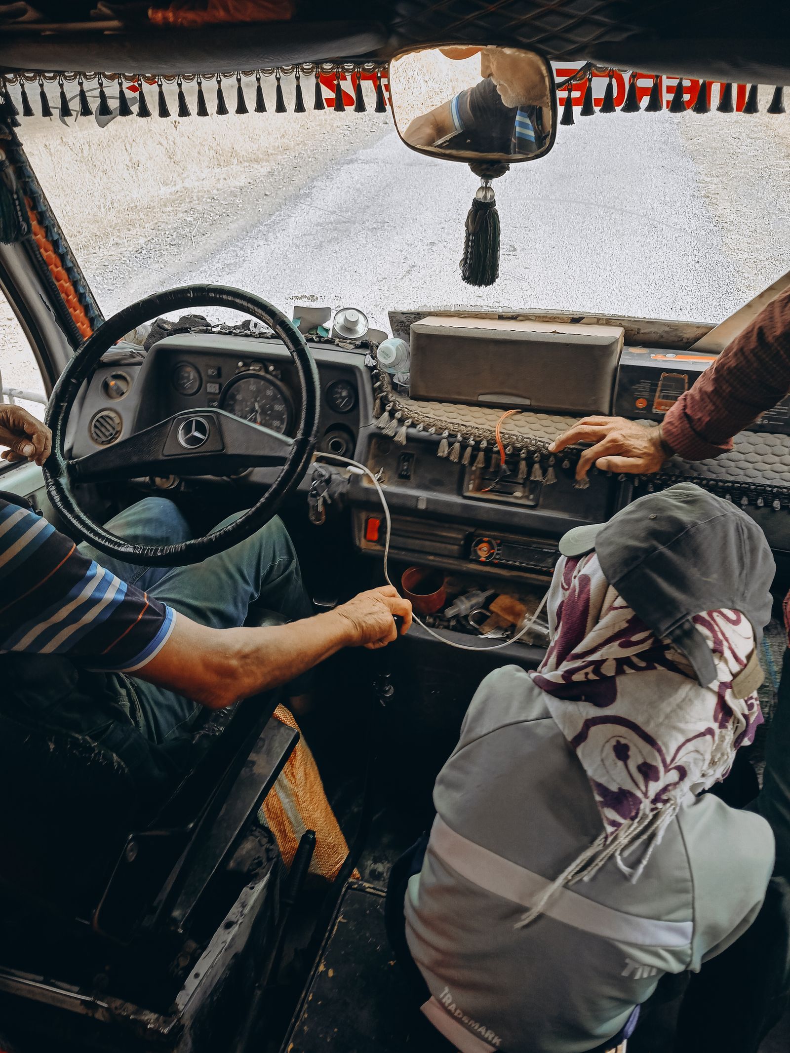 Rustic truck interior with passengers