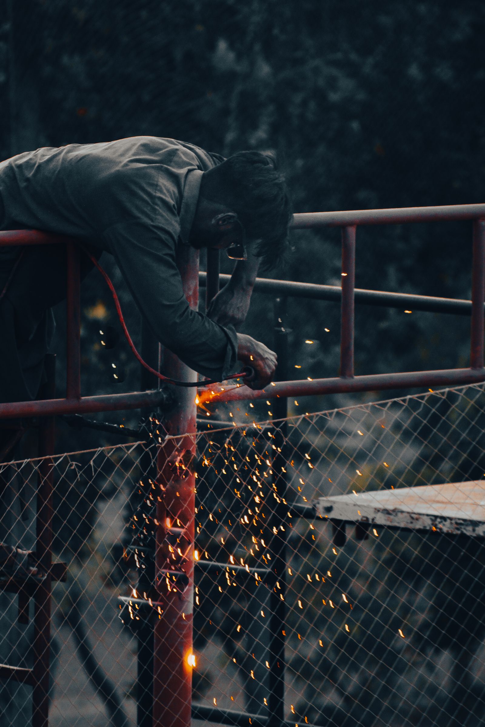 Man welding pipes